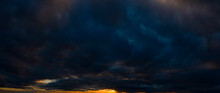 Dark Orange Sky, Sunset, Panorama. Storm Clouds.