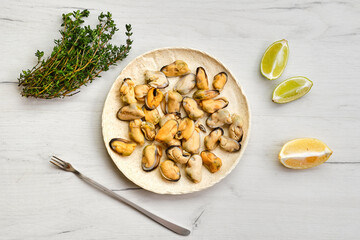 Sticker - Top view of peeled mussels on ceramic plate