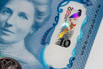 Wall Mural - New Zealand Currency - macro of a ten dollar banknote. Close up of the new polymer ten dollar banknote with enhanced counterfeit resilience including a hologram.