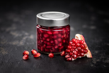 Canvas Print - Slate slab with preserved Pomegranate seeds (selective focus; close-up shot)