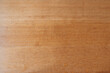 © pbombaert - Wooden board of a rustic table view in close up from top