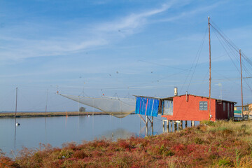 Canvas Print - fishing workers po delta regional park comacchio iitaly