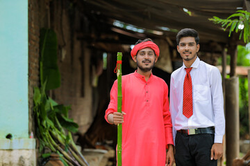 Poster - Young indian farmer with agronomist or banker at home