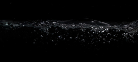  Wave of water on a black background