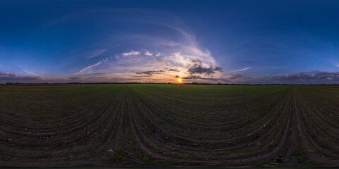 Wall Mural - full seamless spherical hdri panorama 360 degrees angle view on among farm fields in autumn evening before sunset with awesome clouds in equirectangular projection, ready for VR AR content