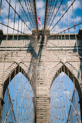  American flag flying over the Brooklyn Bridge