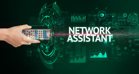 hand holding wireless peripheral with network assistant inscription, modern technology concept