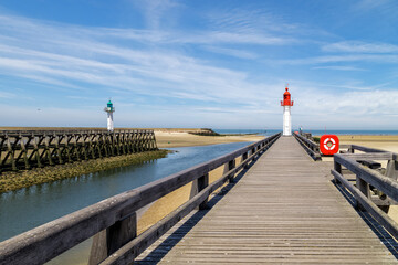 Wall Mural - Red and green lighthouses and wooden piers in Trouville, resort in Normandy, France.