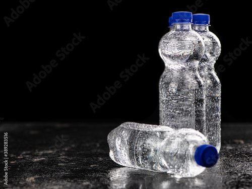 Bottles of sparkling water (chilled; close up shot)