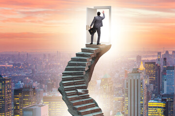 Wall Mural - Concept of career ladder and door with businessman