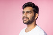 © liliyabatyrova - Portrait of handsome Indian guy standing on pink background