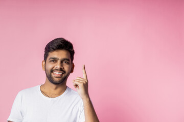 Sticker - Portrait of handsome Indian guy standing on pink background