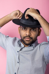 Sticker - Portrait of handsome Indian guy standing on pink background