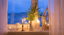 Christmas Evening Windowsill With Burning Candles