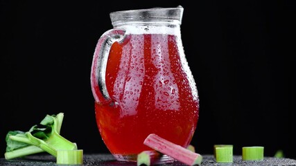 Wall Mural - Fresh made Rhubarb Spritzer on a rotating plate (seamless loopable)