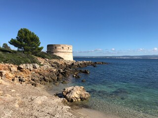 coastal view at torre del lazzaretto, alghero, sardinia, italy