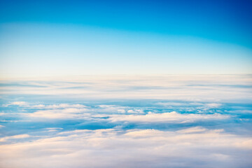 Wall Mural - cloudscape with clear blue sky and fluffy clouds, view from above
