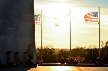 U.S. national flags and Washington Monument during sunset - Washington D.C. Unied Staes of America