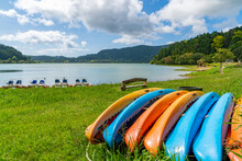 Acores, Island Of Sao Miguel, On The  Lago Das Furnas: Furnas Lake 
In The Foreground Boats And Kayaks For Rent