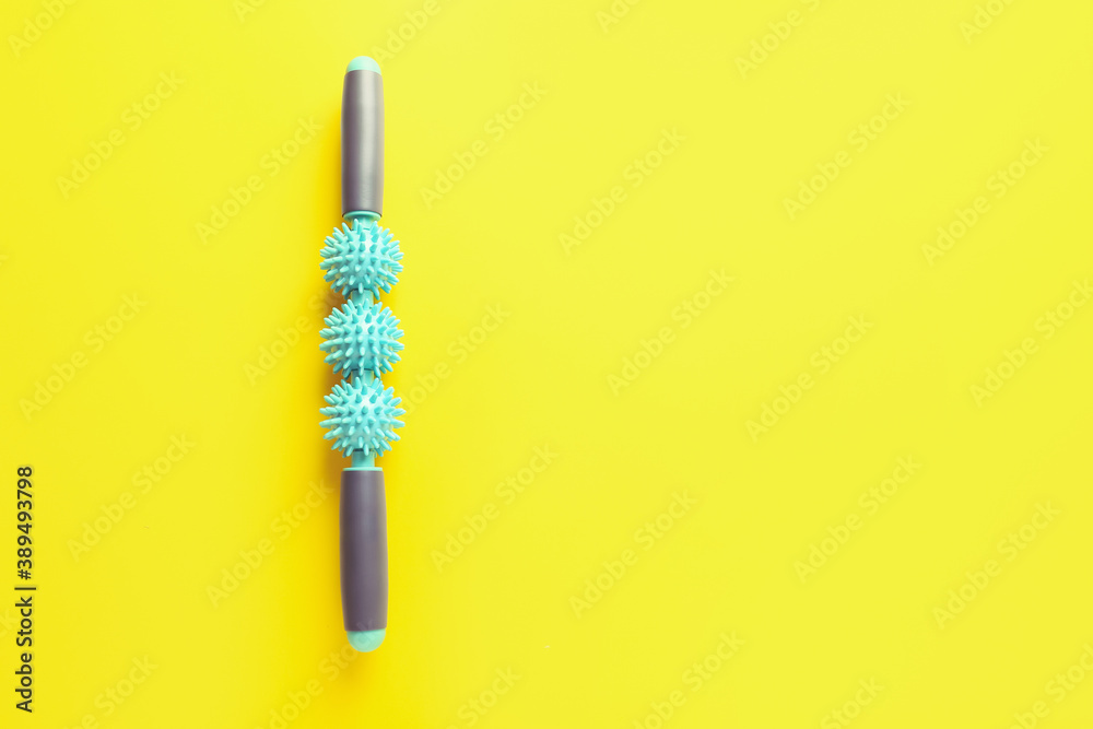 Body roller on color background