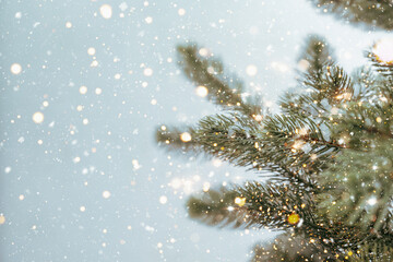 Wall Mural - Closeup of Christmas tree with sparkling light, snowflake. Christmas and New Year holiday background. vintage color tone.