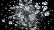 Explosion of water droplets into the camera in slow motion on an isolated black background. 3d illustration
