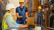 © Gorodenkoff - In Retail Warehouse Manager Uses Computer with Inventory Checking Software, Talks with Storehouse Worker about Package Delivery. International Distribution Center with Shelves Full of Products