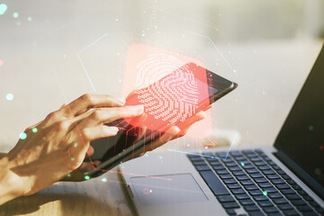 Aufkleber - Multi exposure of abstract fingerprint scan interface and hand working with a digital tablet on background, digital access concept