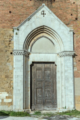 Wall Mural - marble portal of san Franceso church, Montepulciano, Siena, Italy