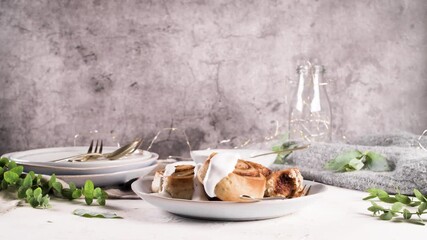 Sticker - Sweet homemade cinnamon rolls on plate.