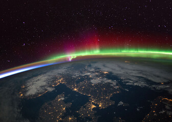 aurora borealis (northern lights) over scandinavia from the international space statio (iss). elemen