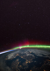 Wall Mural - aurora borealis (northern lights) over scandinavia from the international space statio (iss). elemen