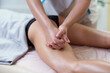 © Viktor Koldunov - Caucasian woman getting a leg massage in the spa salon. Body care concept.