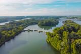 Fototapeta Natura - Aerial panorama of donau river close to Bratislava, Slovakia, seen from Petrzalka district on a sunny morning.