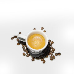 full coffee cup on white background with beans