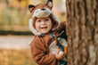 © sushytska - Cute baby boy dressed in fox costume in autumn park