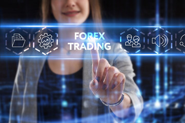 Business, Technology, Internet and network concept. Young businessman working on a virtual screen of the future and sees the inscription: Forex trading