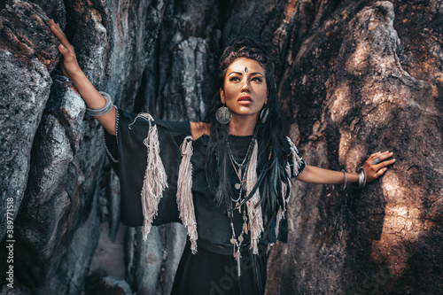 Plakat beautiful young stylish tribal woman outdoors portrait