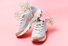 White Sneakers With Flowers On Pink Background, Front View