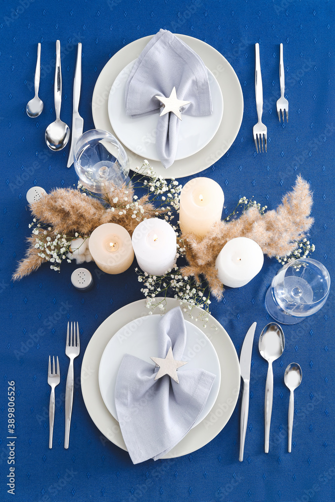 Beautiful table setting on color background