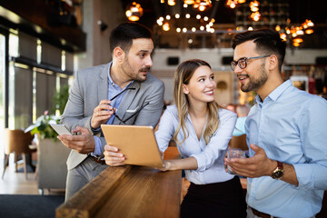 Wall Mural - Business colleagues having conversation during coffee break