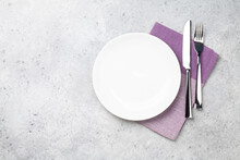 White Empty Plate, Fork, Knife And Napkin