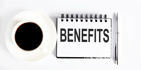 Poster - BENEFITS , planning concept. Spiral notebook with text on white background with coffee