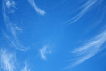 Beautiful Cirrus clouds in a very beautiful pattern on the blue sky.