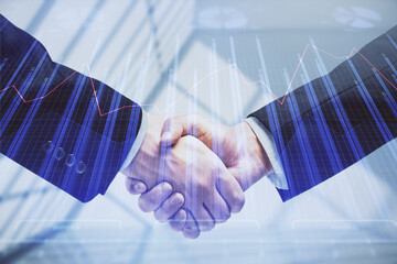 Double exposure of forex graph hologram and handshake of two men. Stock market concept.