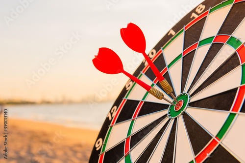 Fotomural Dart arrow hitting to center on bullseye (bull's-eye) dartboard is the target of