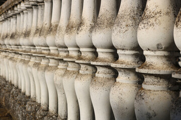 Decorative style of cement railings in gray color with weathered texture 