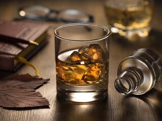 Wall Mural - Backlit glass of whisky on the rocks