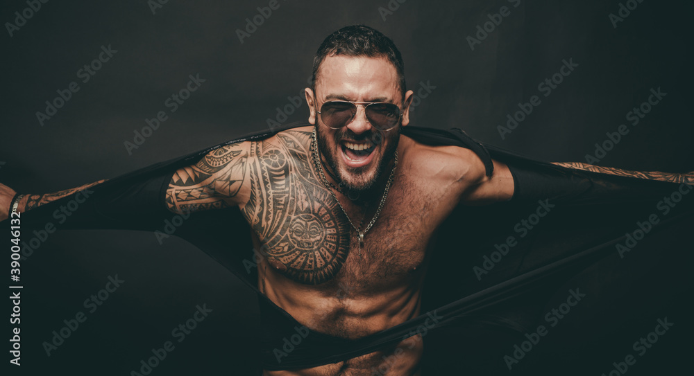 Furious man ripped shirt isolated on black. Muscular shirtless male ...