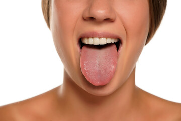 young woman sticking out her tongue